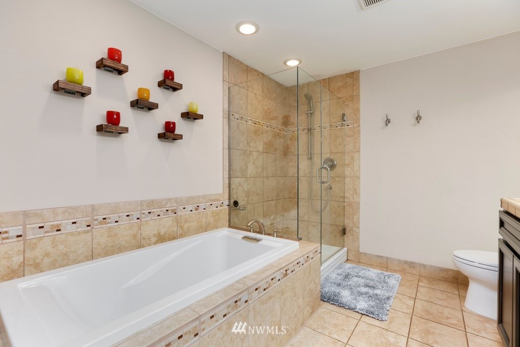 2329 Cedar Road Lake Stevens, WA 98258 - Photo 17 of 40 a bathroom with a bathtub and shower