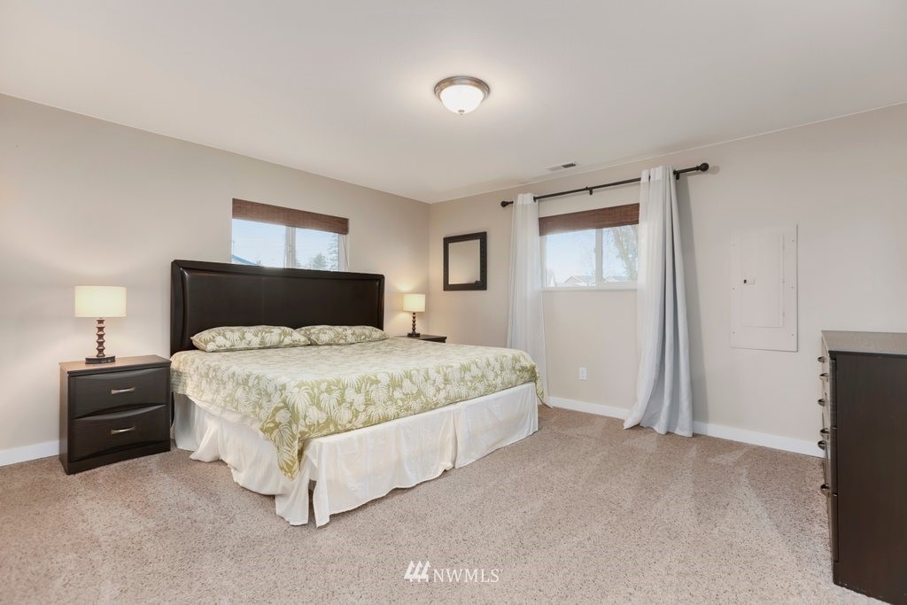 2329 Cedar Road Lake Stevens, WA 98258 - Photo 19 of 40 a bedroom with a bed and a tv