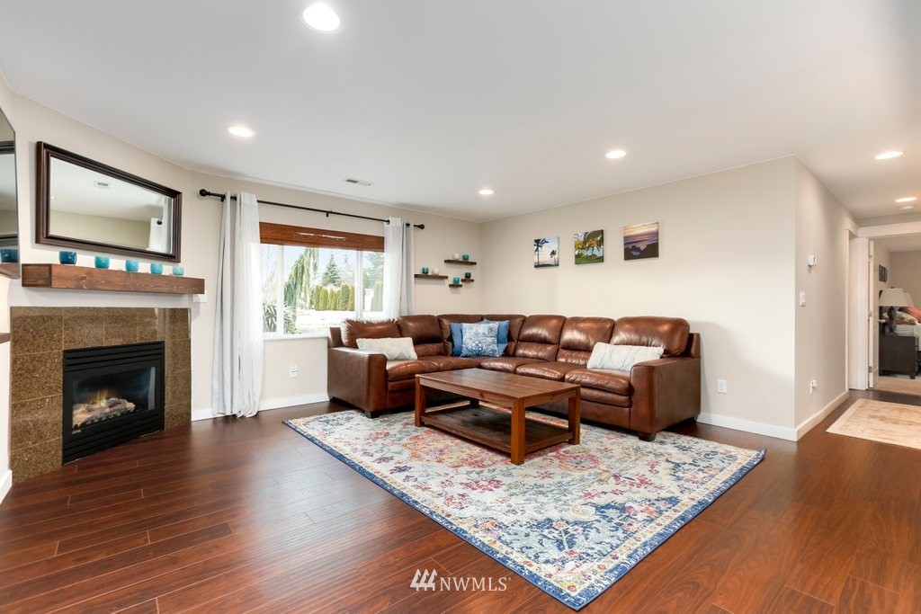 2329 Cedar Road Lake Stevens, WA 98258 - Photo 3 of 40 a living room with furniture and a fireplace
