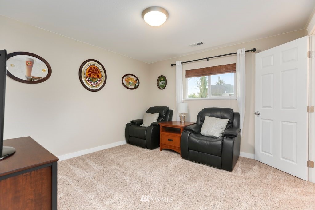 2329 Cedar Road Lake Stevens, WA 98258 - Photo 22 of 40 a living room with furniture and a window