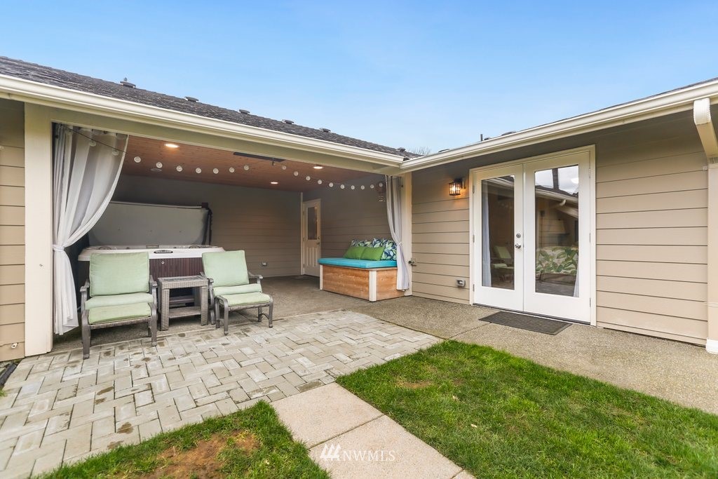 2329 Cedar Road Lake Stevens, WA 98258 - Photo 29 of 40 a backyard of a house with outdoor seating and a garden