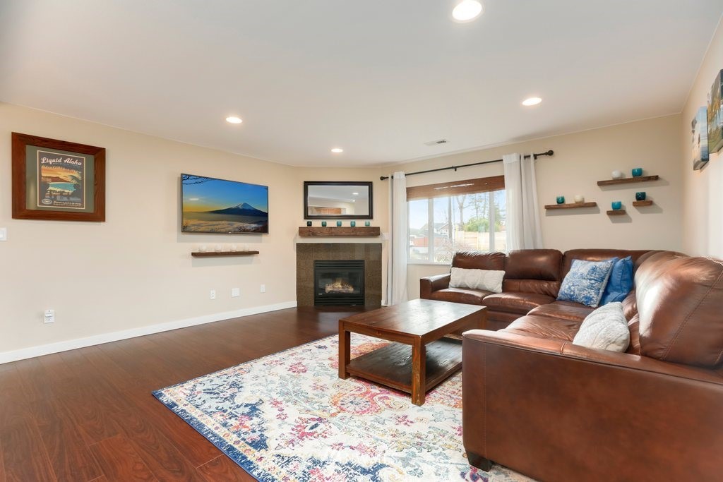 2329 Cedar Road Lake Stevens, WA 98258 - Photo 4 of 40 a living room with furniture and a fireplace