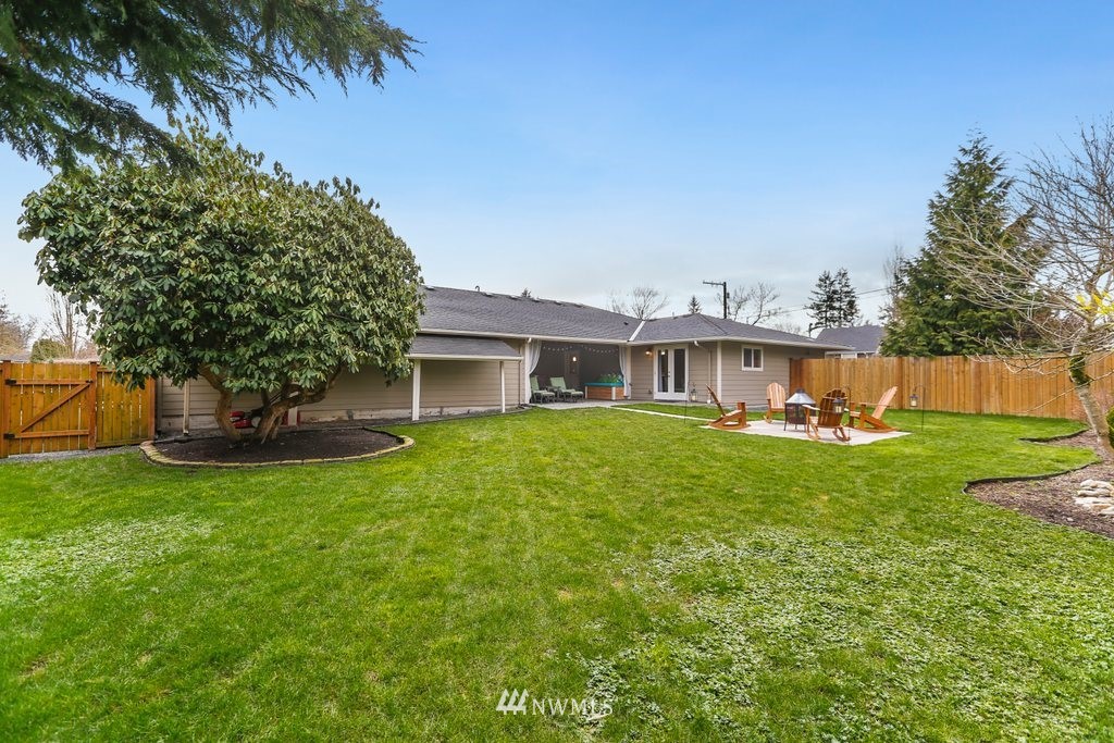 2329 Cedar Road Lake Stevens, WA 98258 - Photo 32 of 40 a front view of a house with a garden