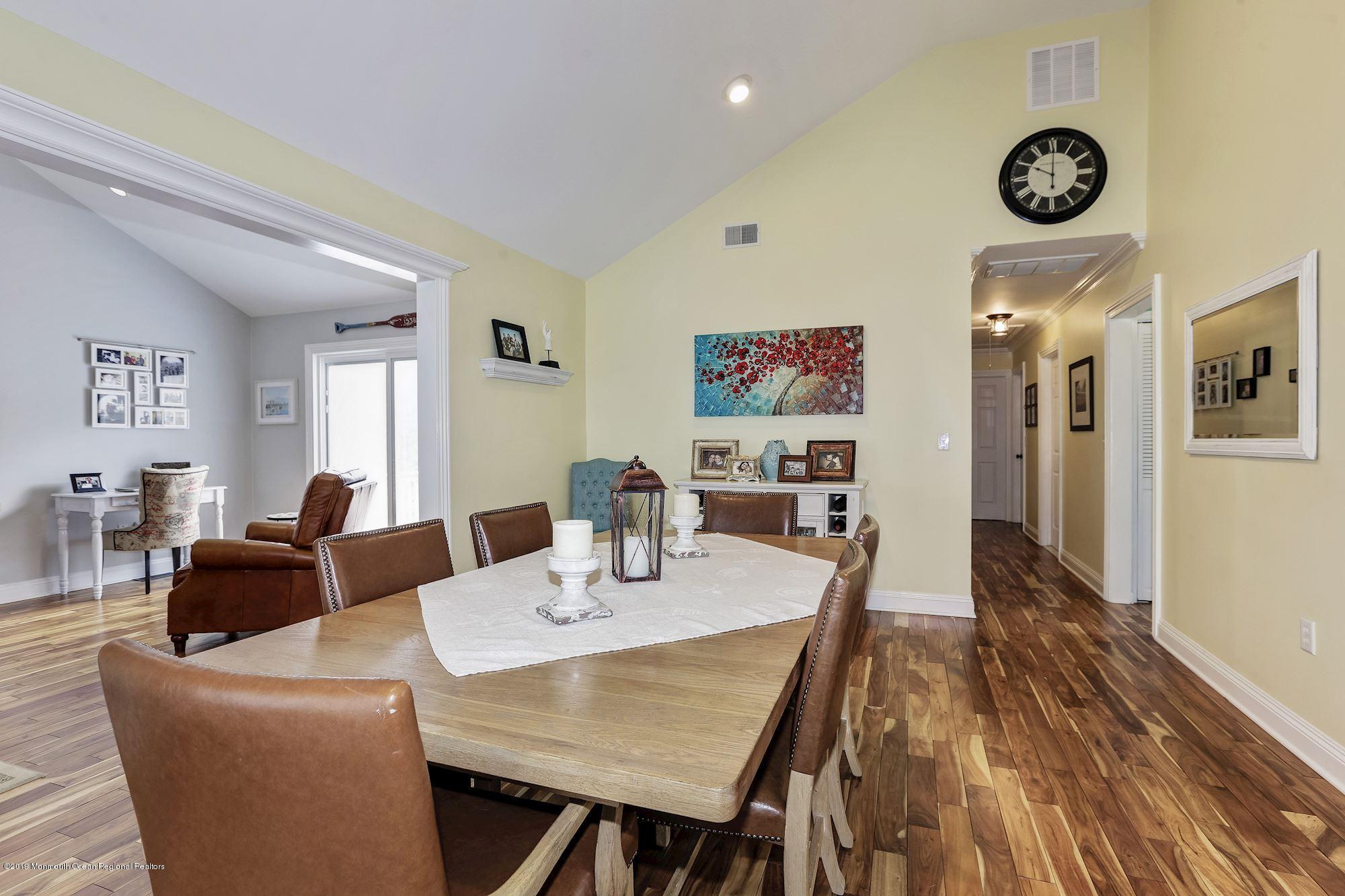 409 Raleigh Road Brick, NJ 08723 - Photo 14 of 33 a view of a dining room with furniture and wooden floor