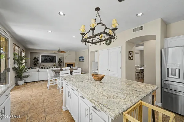 a kitchen with a counter space cabinets and appliances
