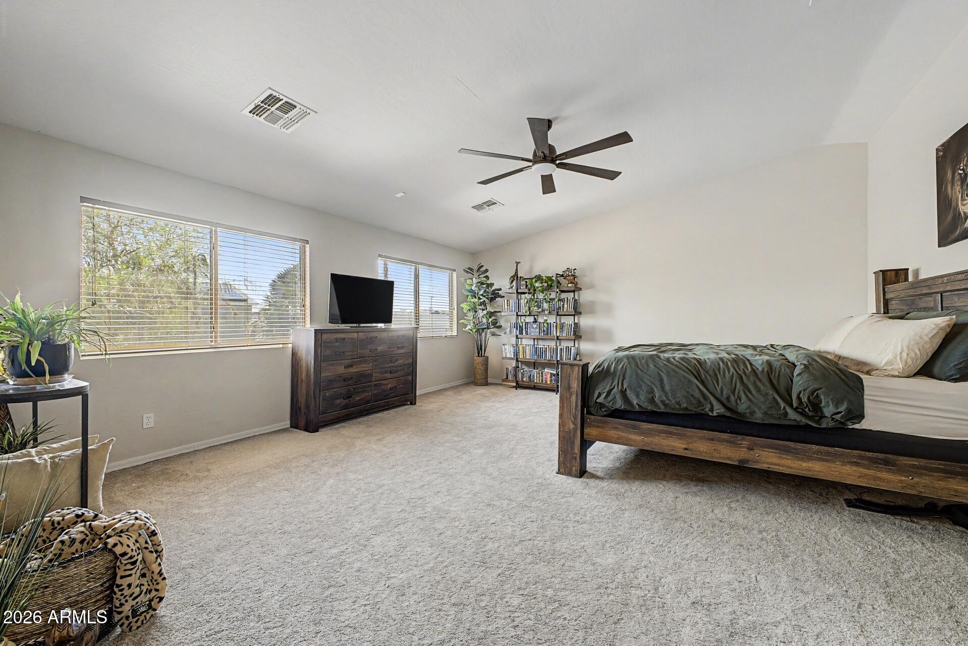 3595 East Latham Way Gilbert, AZ 85297 - Photo 15 of 35 a living room with furniture and a window