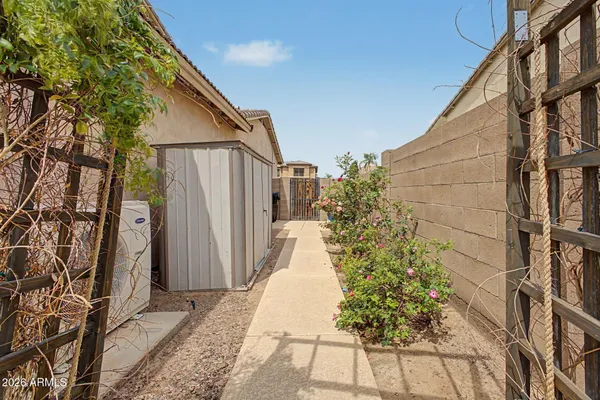 a view of a house with a small yard