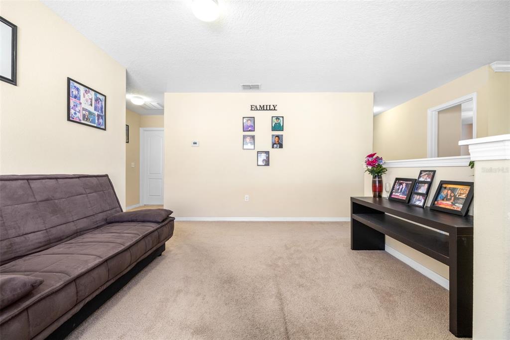 1564 Imperial Key Drive Trinity, FL 34655 - Photo 17 of 40 a living room with furniture