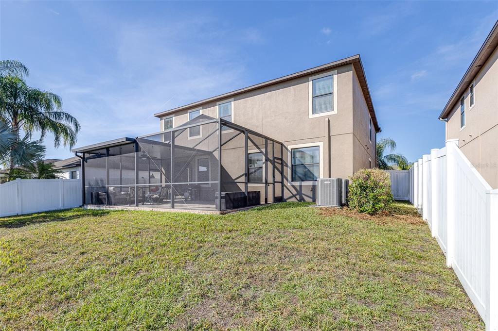 1564 Imperial Key Drive Trinity, FL 34655 - Photo 34 of 40 a view of a house with a yard