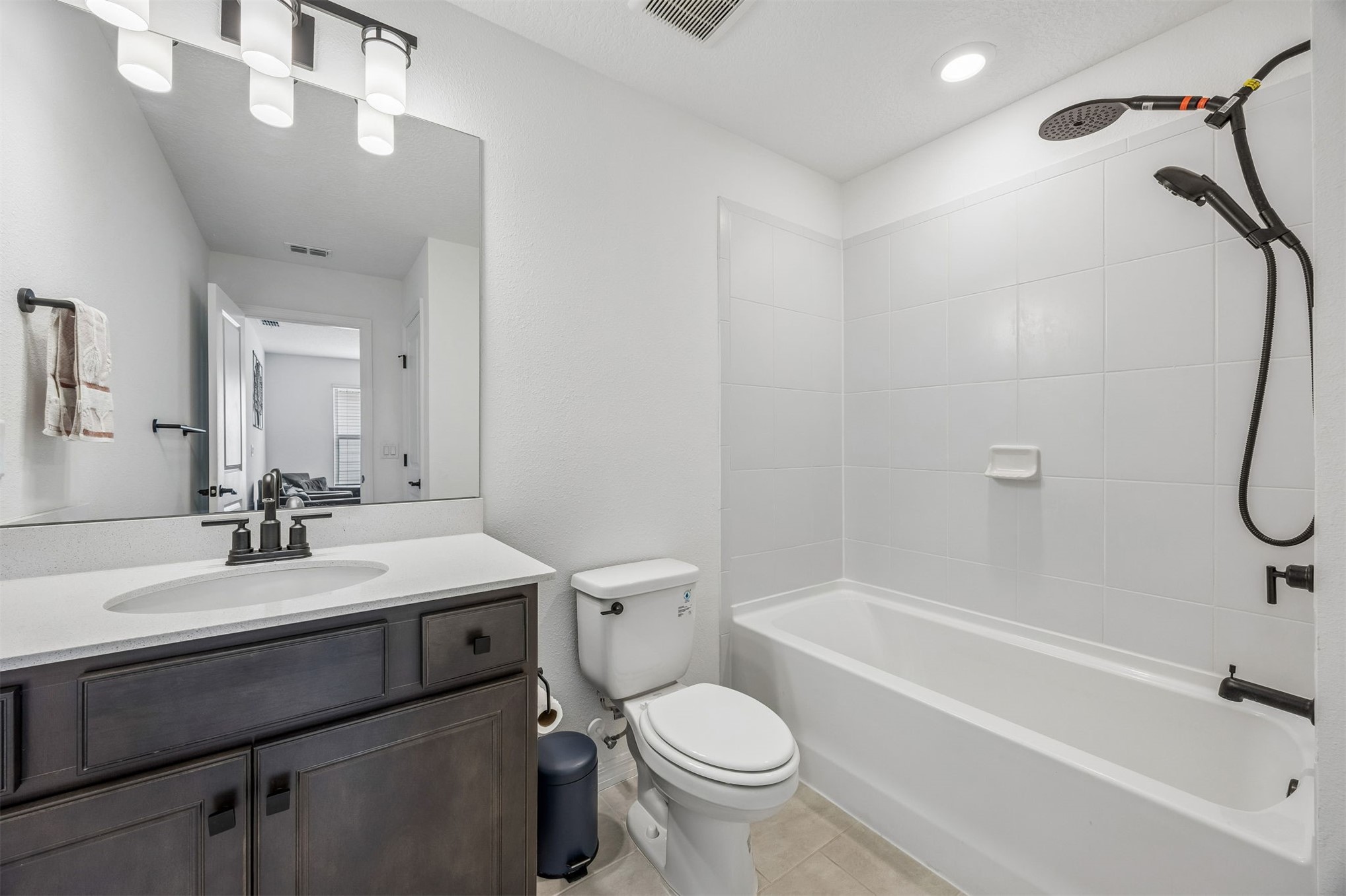 236 Hawthorn Park Circle Yulee, FL 32097 - Photo 19 of 28 a bathroom with a sink a toilet and shower