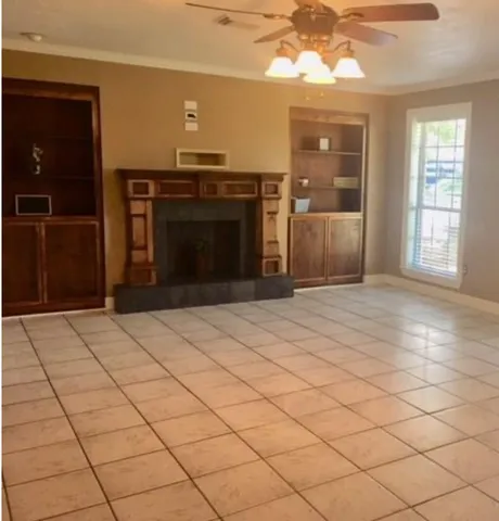 a view of a livingroom with a fireplace