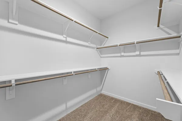 a view of an empty walk in closet