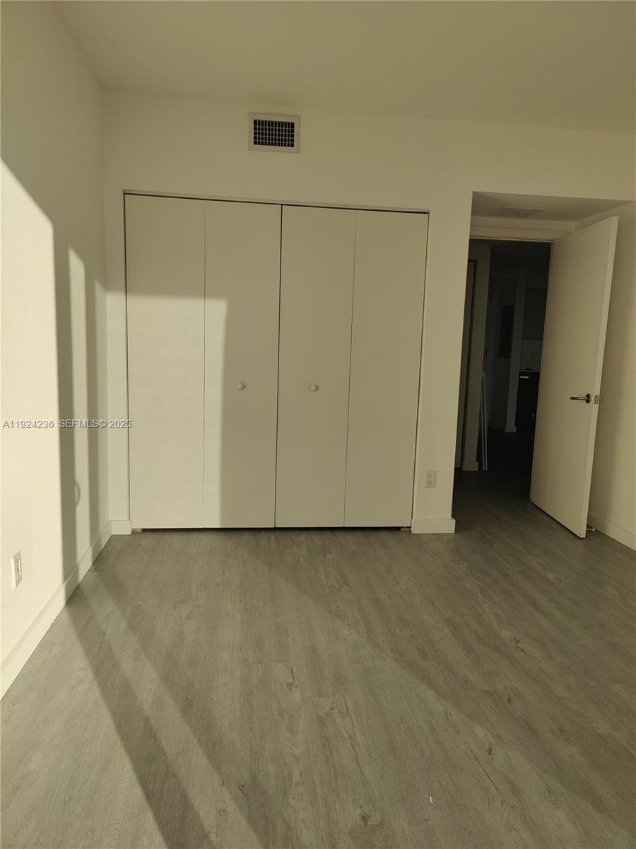 4250 Biscayne Boulevard, Unit 514 Miami, FL 33137 - Photo 12 of 16 a view of an empty room
