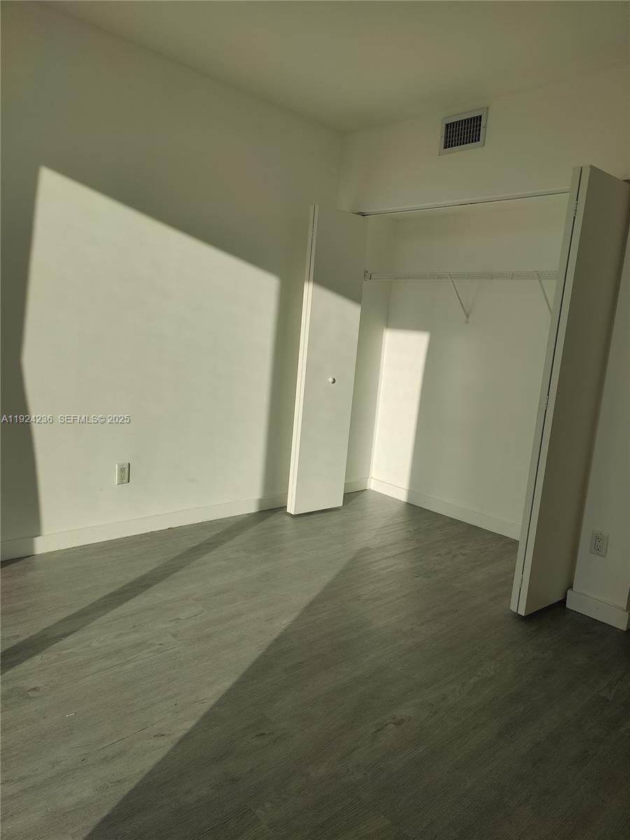 4250 Biscayne Boulevard, Unit 514 Miami, FL 33137 - Photo 13 of 16 an empty room with an empty space