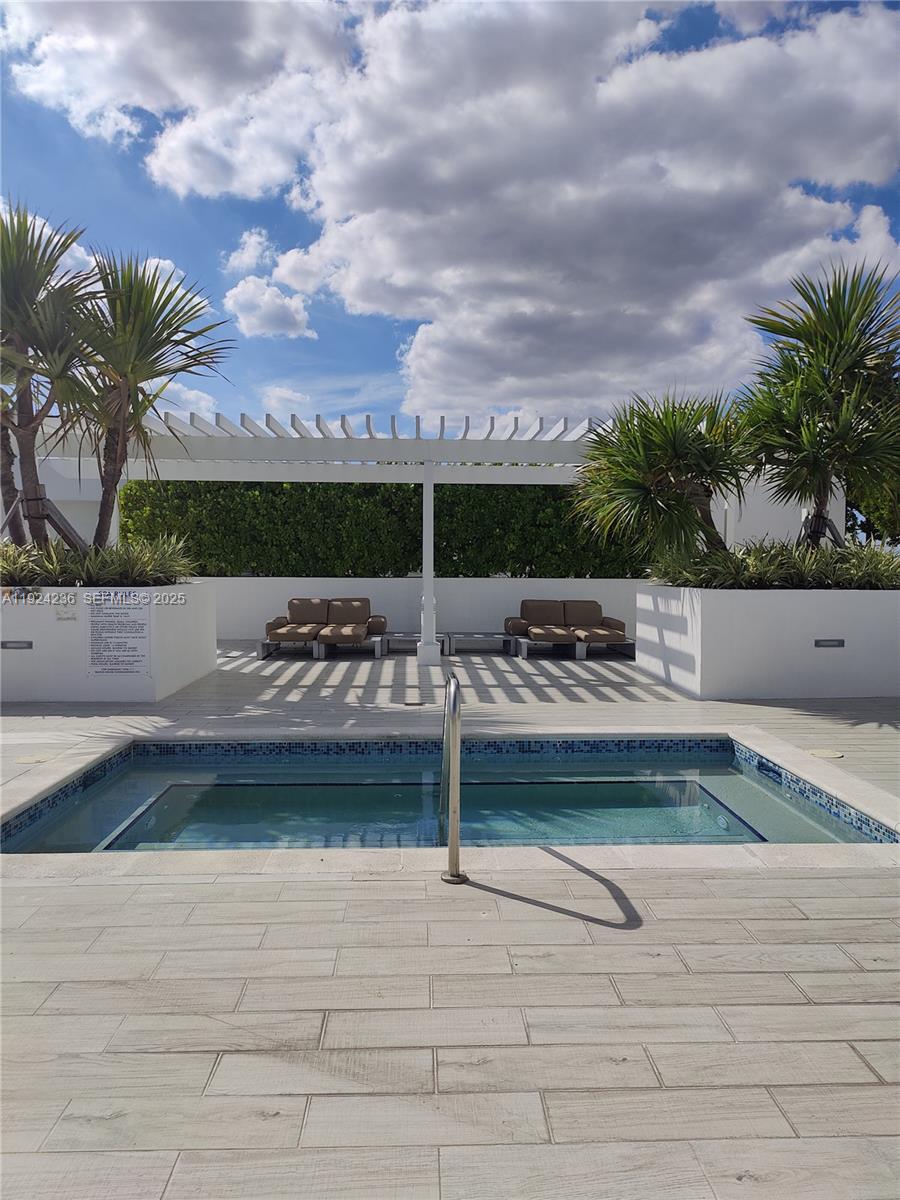 4250 Biscayne Boulevard, Unit 514 Miami, FL 33137 - Photo 4 of 16 a view of outdoor space with seating