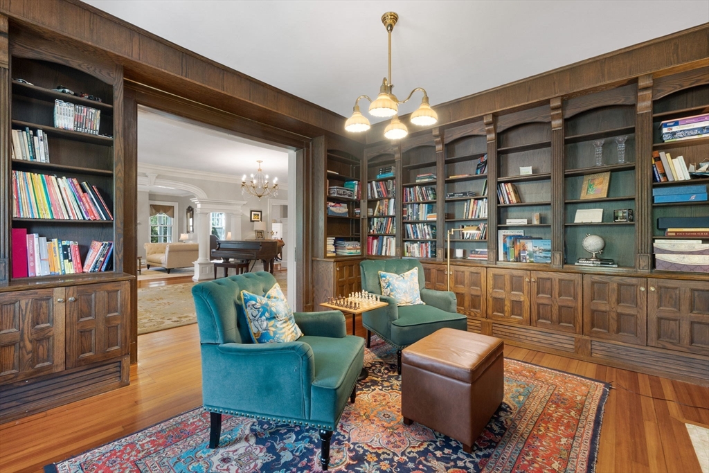 20 Eulow Street Swampscott, MA 01907 - Photo 11 of 42 a living room with furniture and a book shelf