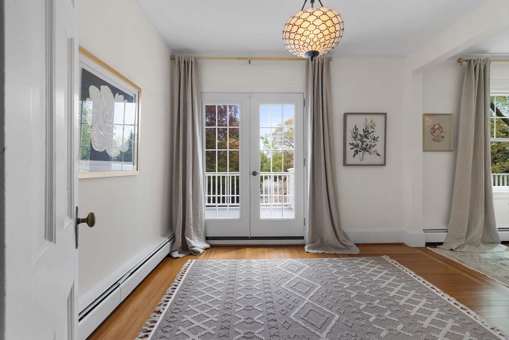 20 Eulow Street Swampscott, MA 01907 - Photo 16 of 42 a view of a room with entryway wooden floor and windows