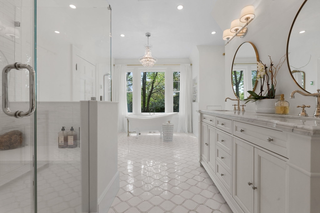 20 Eulow Street Swampscott, MA 01907 - Photo 17 of 42 a bathroom with a double vanity sink mirror and shower