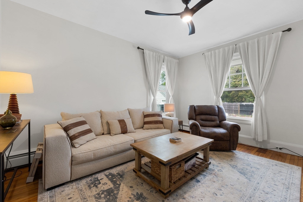 20 Eulow Street Swampscott, MA 01907 - Photo 28 of 42 a living room with furniture a rug and a window