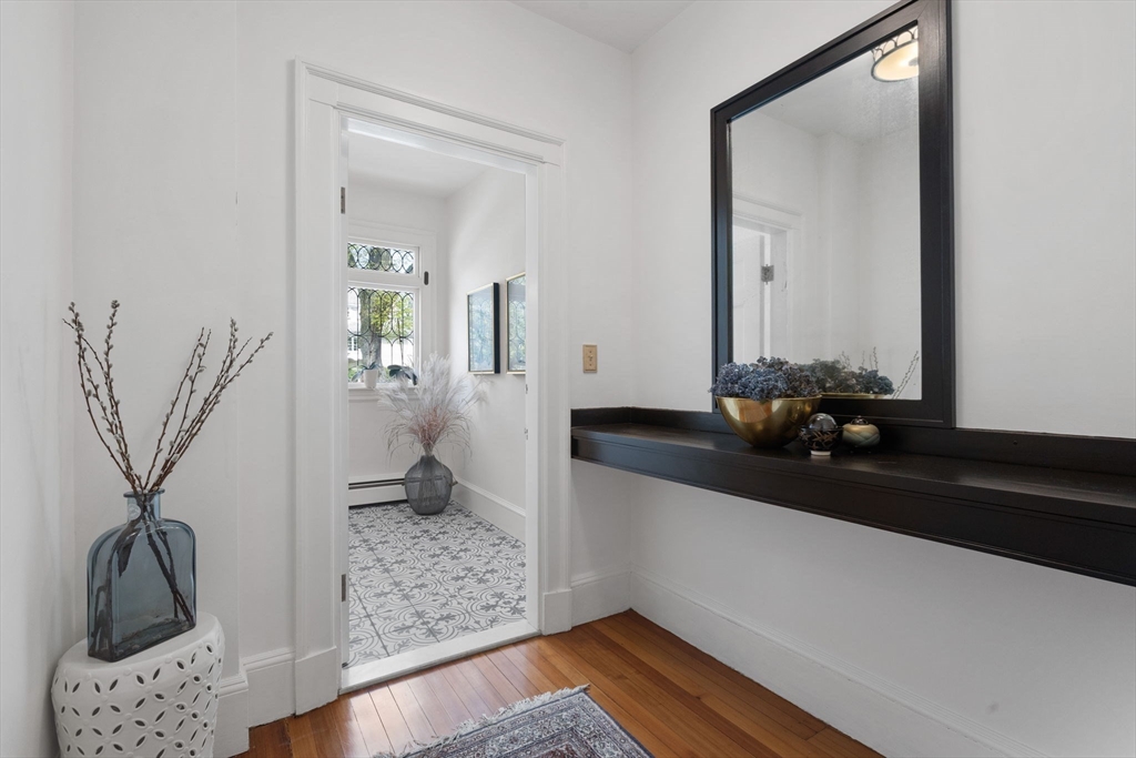 20 Eulow Street Swampscott, MA 01907 - Photo 29 of 42 a bathroom with a sink and a mirror