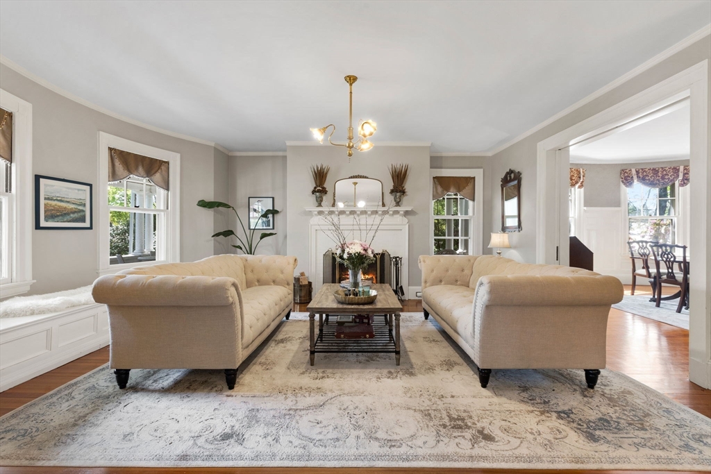 20 Eulow Street Swampscott, MA 01907 - Photo 4 of 42 a living room with furniture and a chandelier