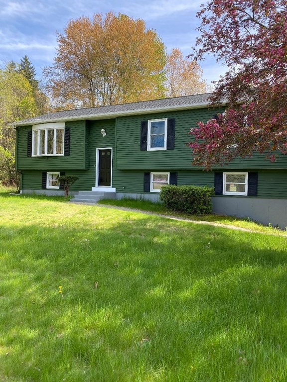 3085 Boston Road Wilbraham, MA 01095 - Photo 1 of 1 a view of a house with a yard