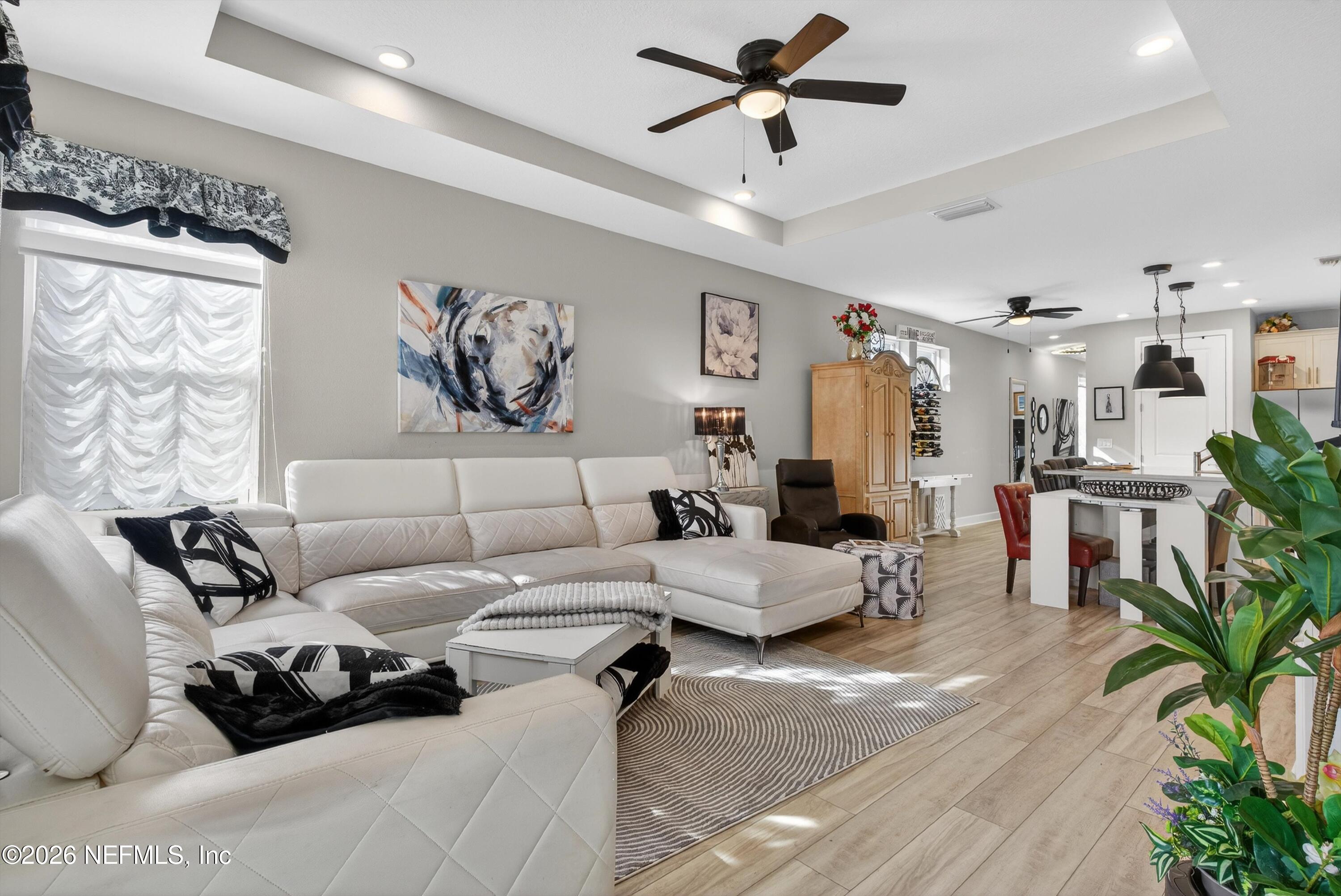 1055 Rustic Mill Dr Street St. Augustine, FL 32092 - Photo 13 of 87 a living room with furniture and a large window