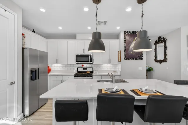 a view of a city with an ocean