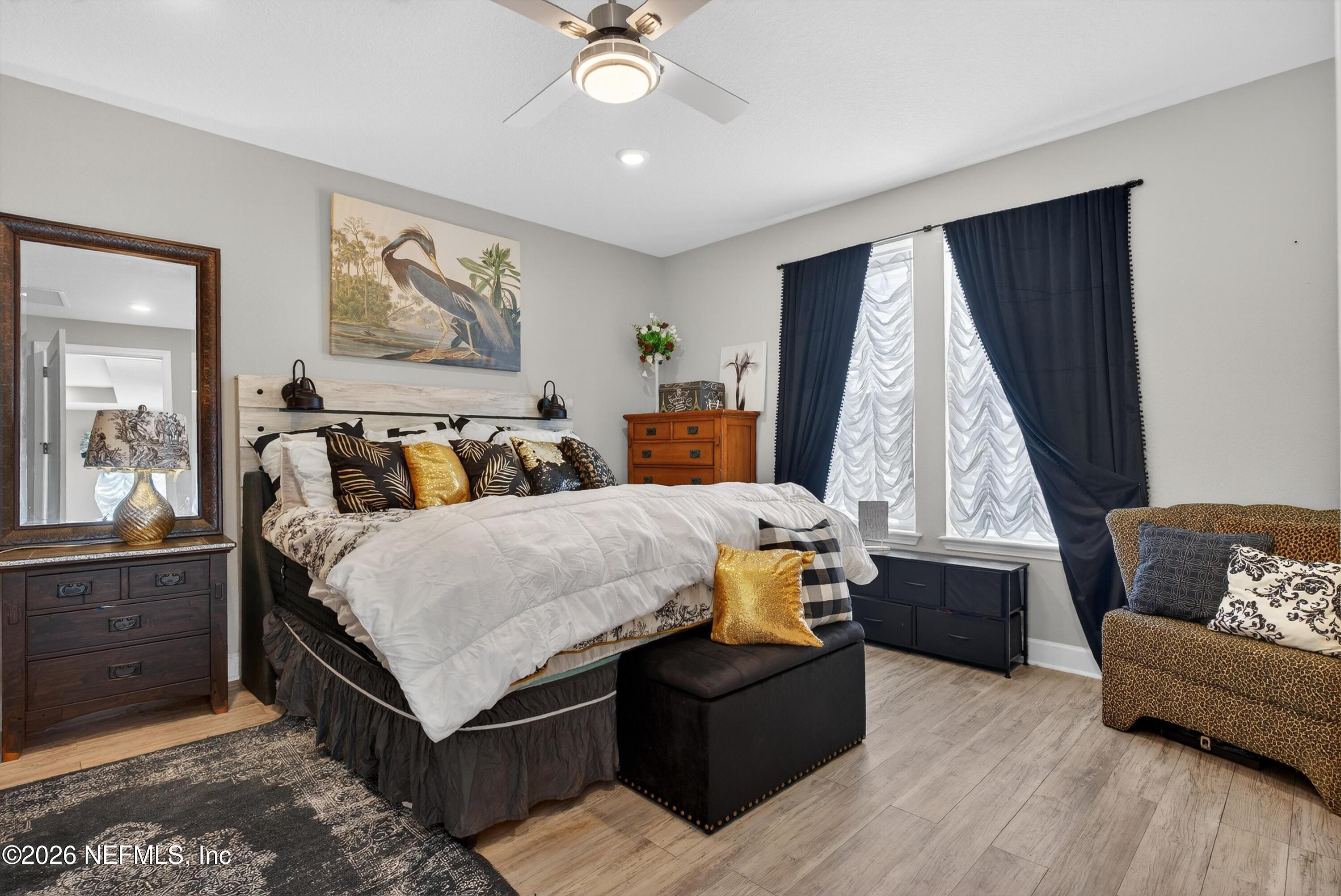 1055 Rustic Mill Dr Street St. Augustine, FL 32092 - Photo 18 of 87 a bed room with a bed and a couch