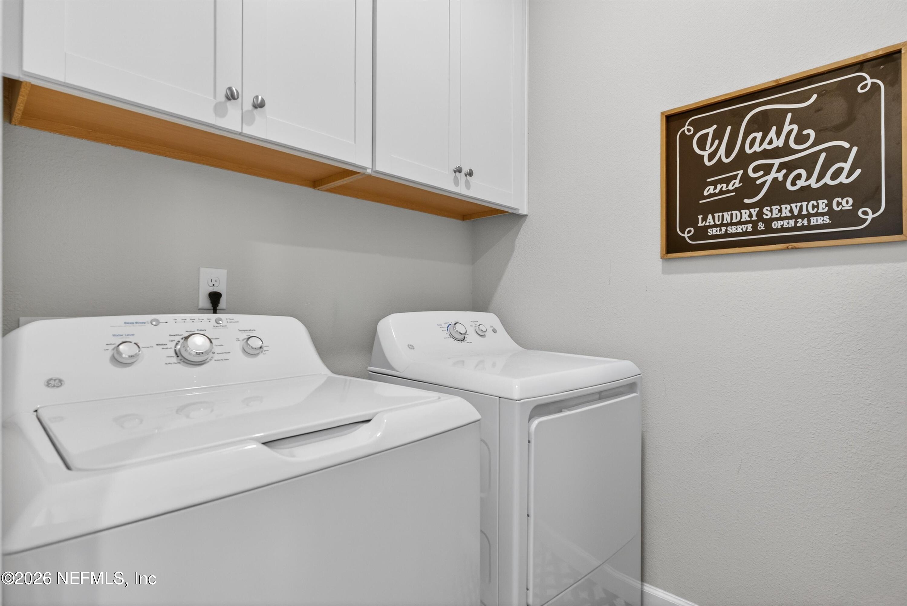 1055 Rustic Mill Dr Street St. Augustine, FL 32092 - Photo 26 of 87 a utility room with dryer and washer