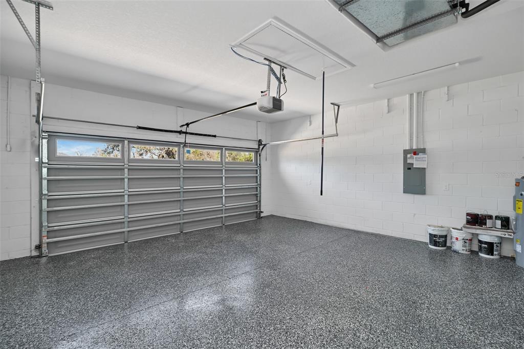 7604 Southwest 103rd Loop Ocala, FL 34476 - Photo 17 of 20 a view of a room with stairs and a cabinet