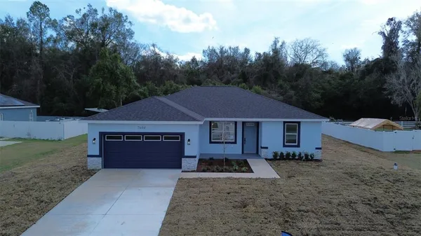 a house view with a garden space