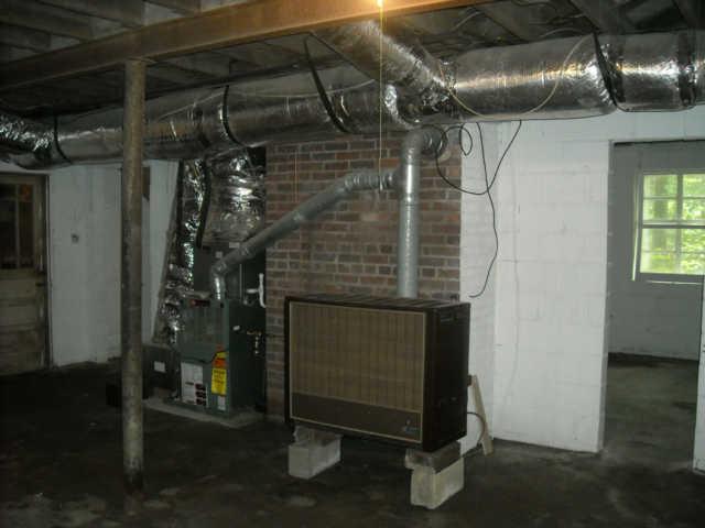 881 Thompson Road Pegram, TN 37143 - Photo 8 of 12 Basement with Wood burning Stove