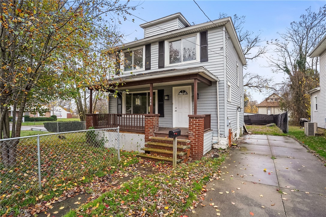 888 Dan Street Akron, OH 44310 - Photo 2 of 36 View of front of home with a porch and cooling unit