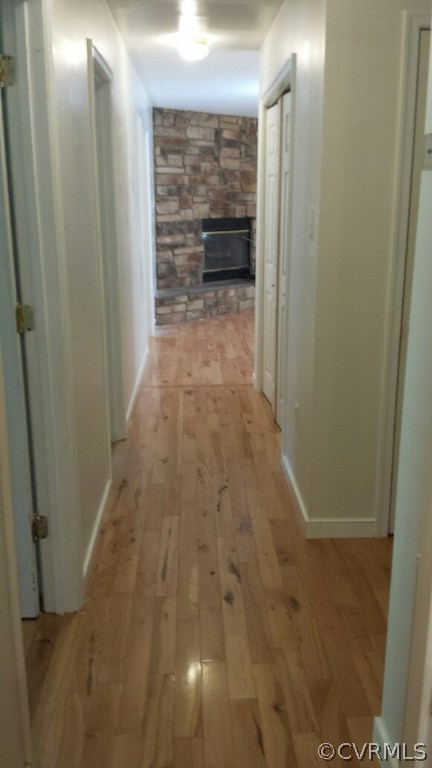 5520 Swann Road Powhatan, VA 23139 - Photo 11 of 16 Hallway with beautiful cabin style hardwood floori