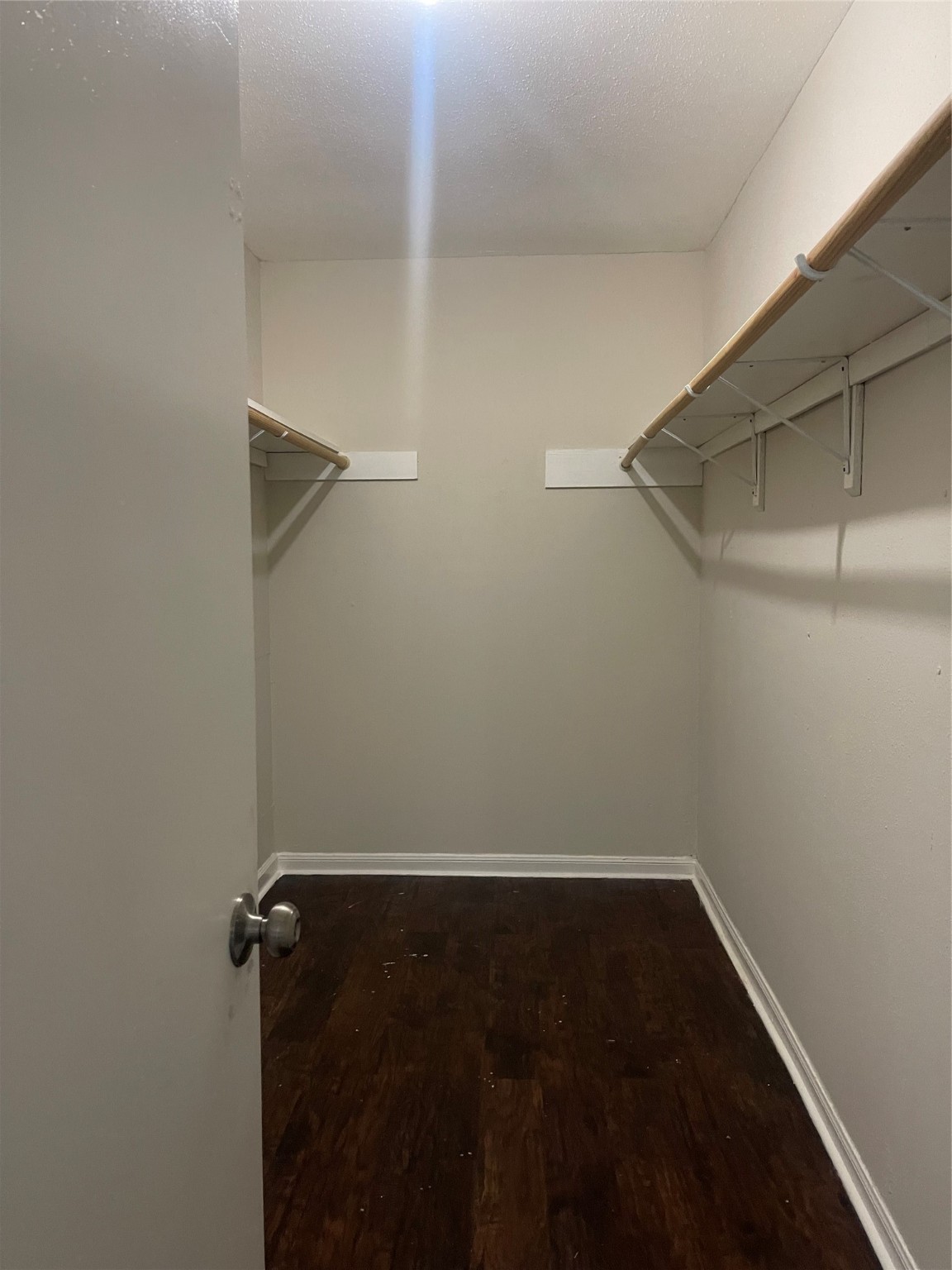 7715 Rolling Ridge Drive Houston, TX 77072 - Photo 4 of 6 a view of small space with racks on the wall