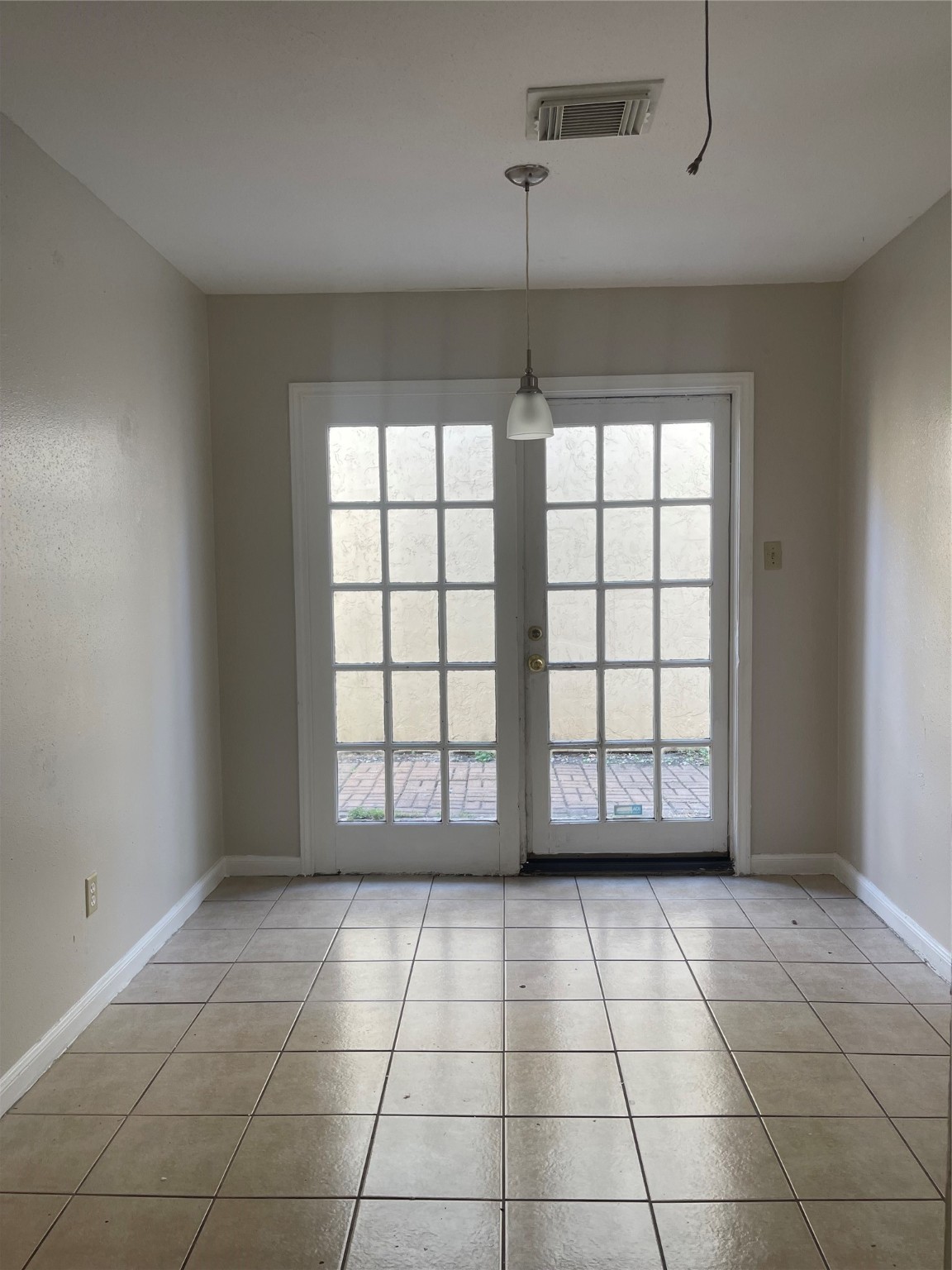 7715 Rolling Ridge Drive Houston, TX 77072 - Photo 6 of 6 a view of an empty room with a window