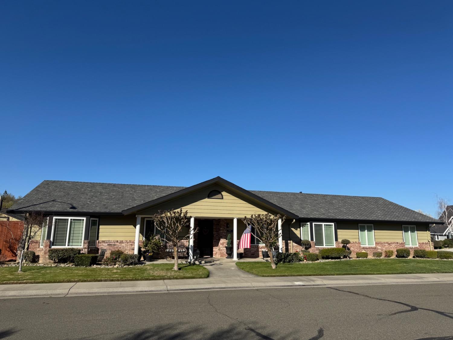 1547 Timberlake Circle Lodi, CA 95242 - Photo 1 of 1 a front view of a building with a garden