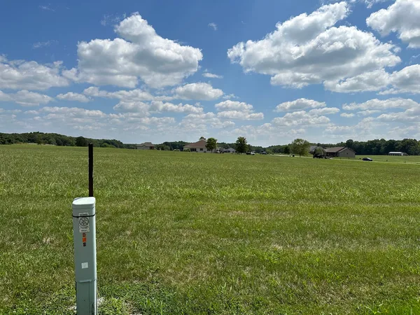a view of a lake with a big yard