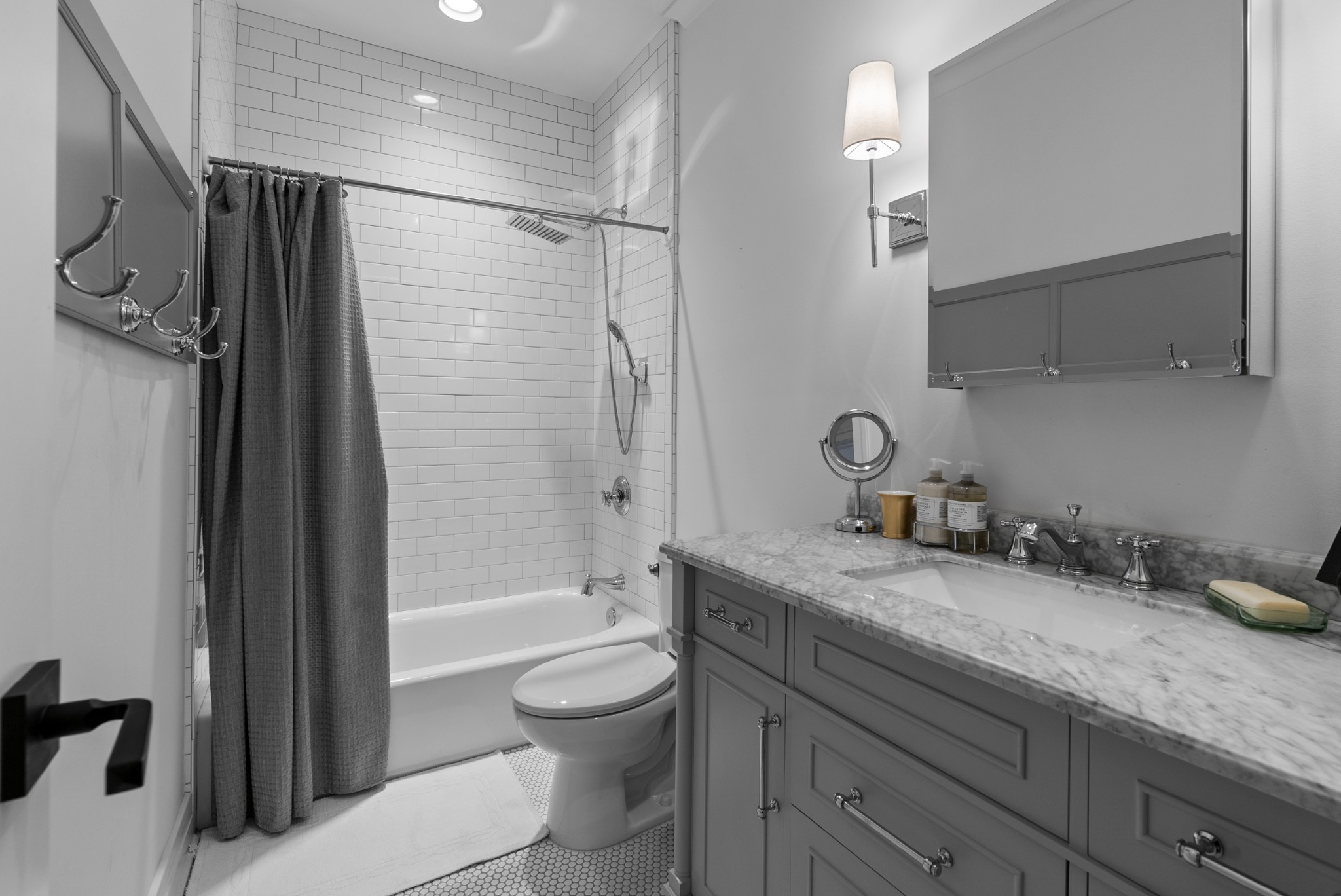 4487 Post Place, Unit 169 Nashville, TN 37205 - Photo 26 of 32 a bathroom with a granite countertop sink a toilet a mirror and shower