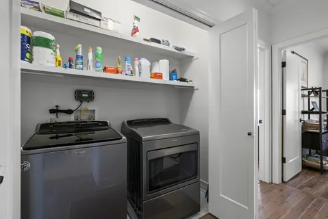a utility room with washer and dryer