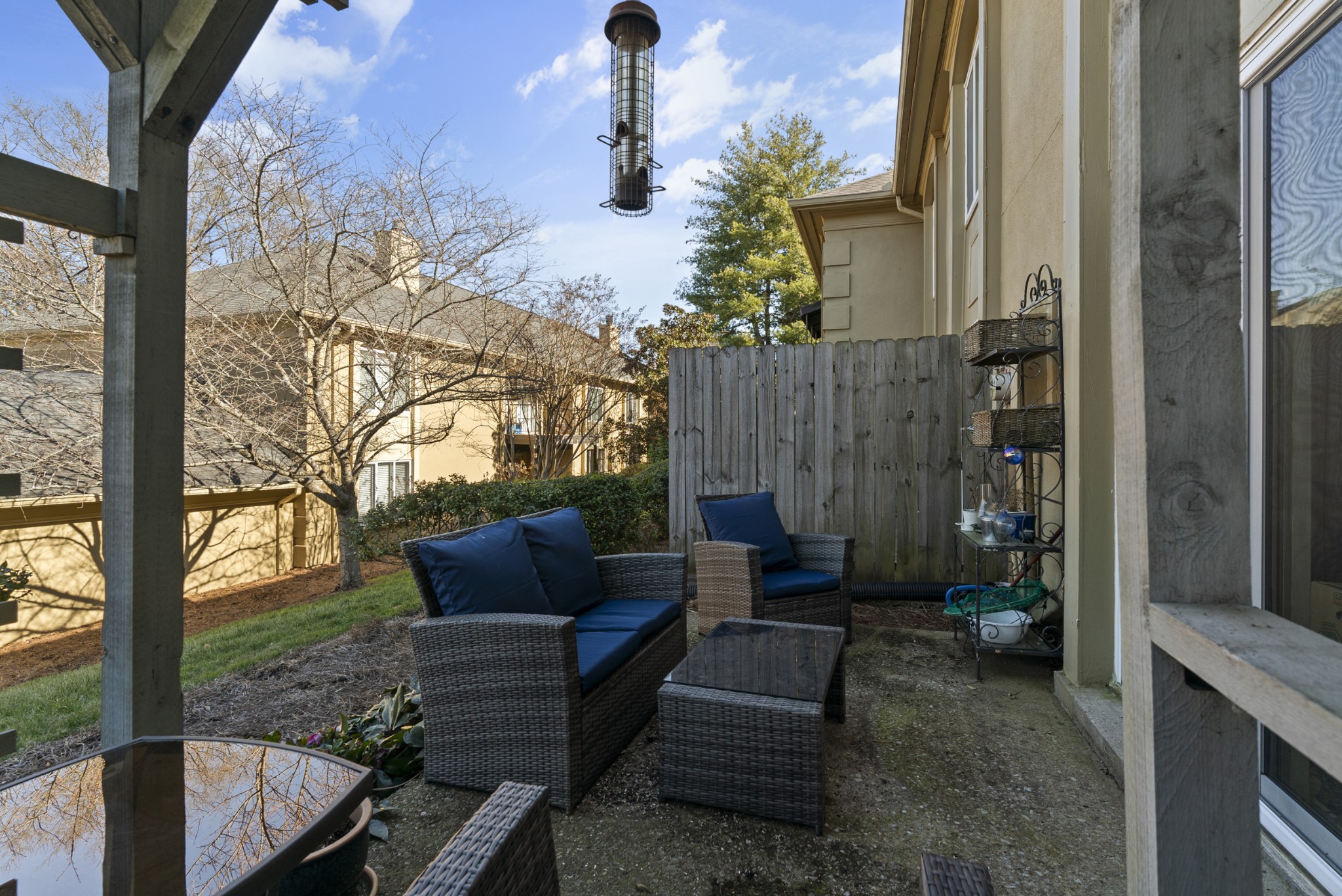 4487 Post Place, Unit 169 Nashville, TN 37205 - Photo 30 of 32 a view of backyard with outdoor seating and plants