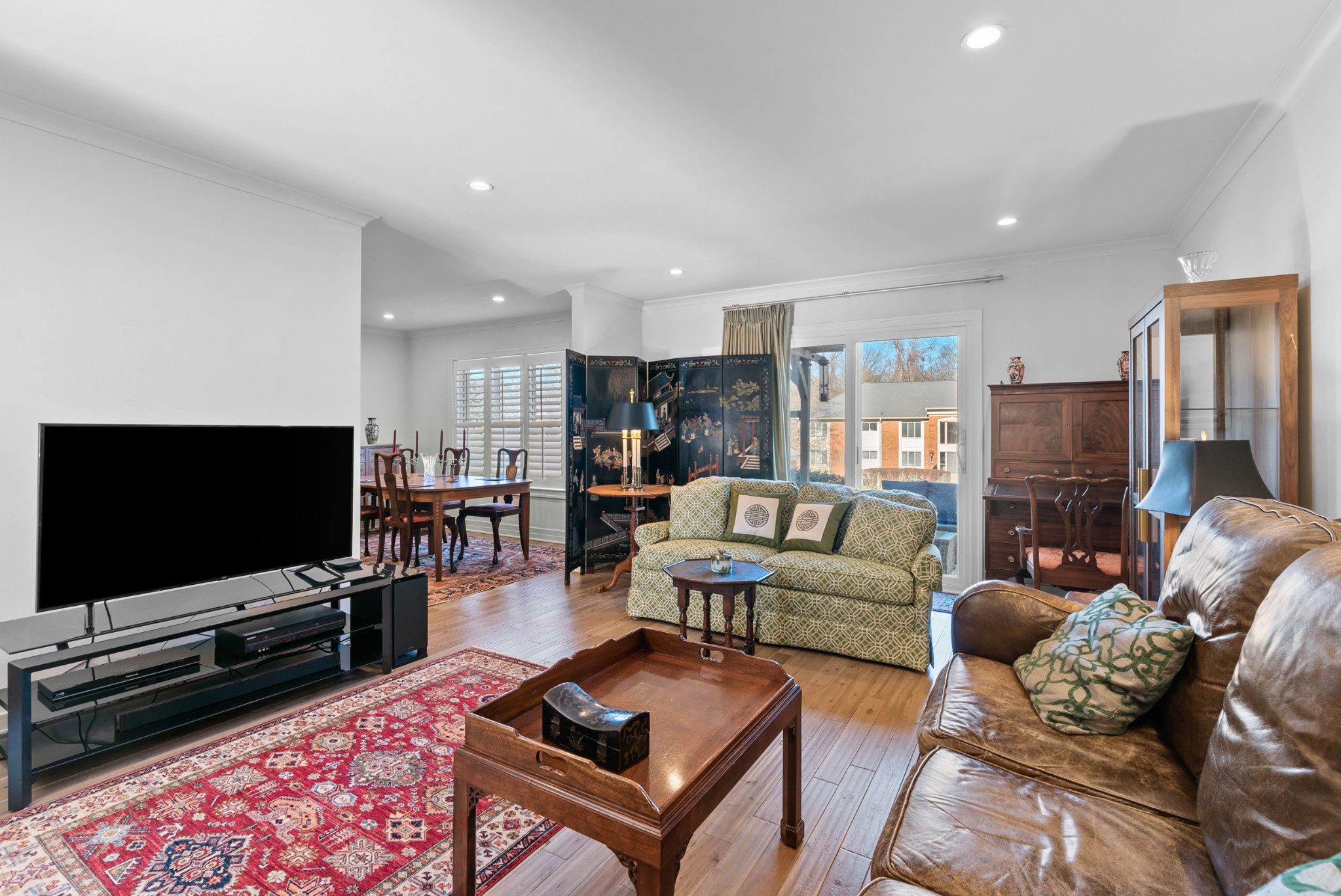 4487 Post Place, Unit 169 Nashville, TN 37205 - Photo 5 of 32 a living room with furniture and a flat screen tv