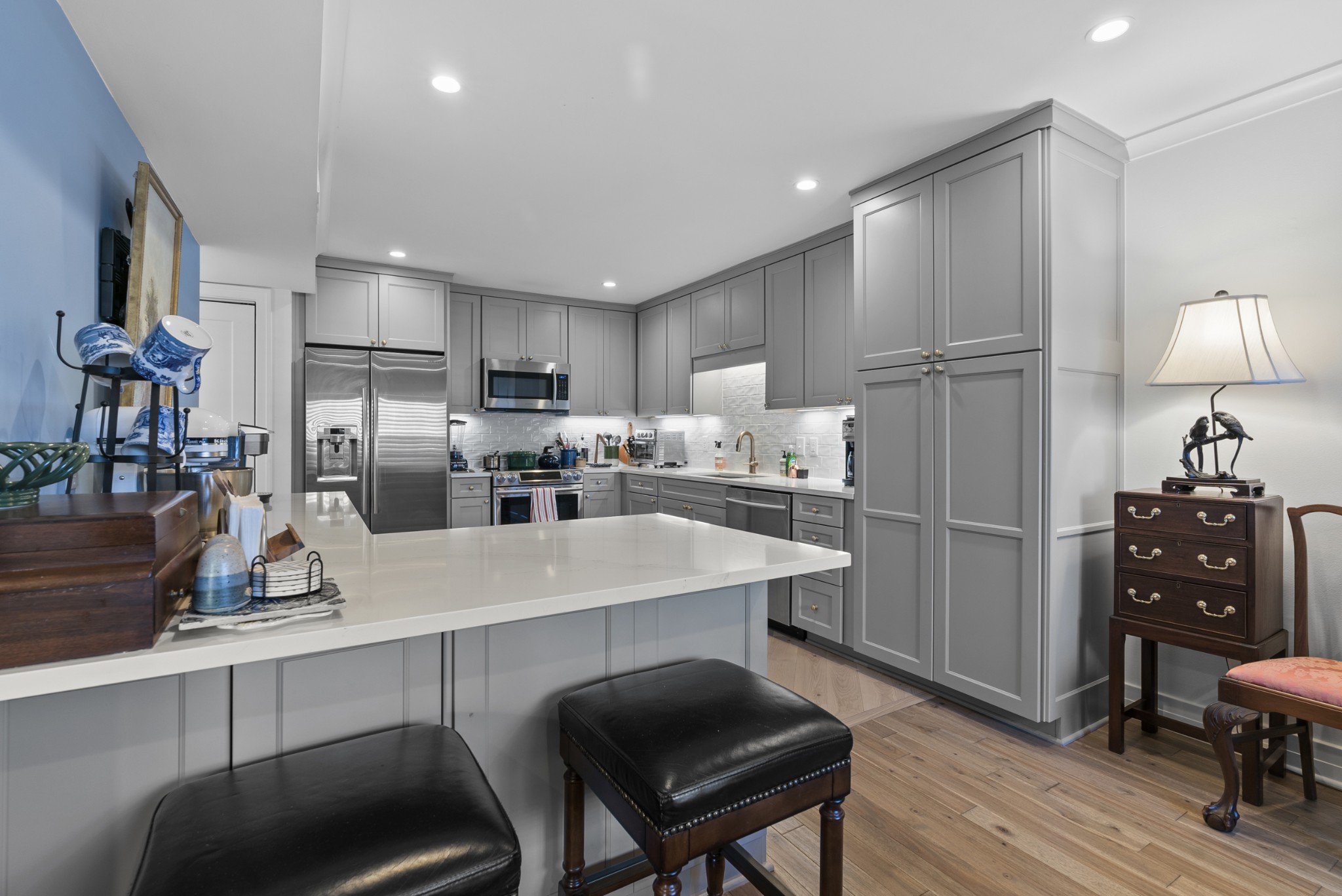 4487 Post Place, Unit 169 Nashville, TN 37205 - Photo 7 of 32 a kitchen with refrigerator and cabinets