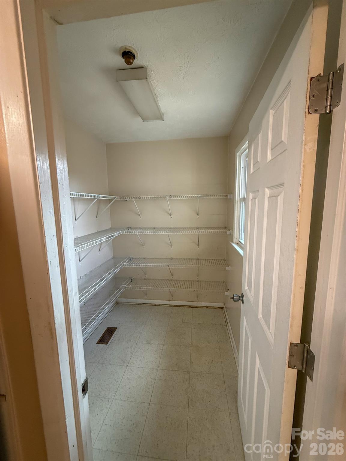 483 Caribou Road Asheville, NC 28803 - Photo 15 of 26 a view of storage and utility room