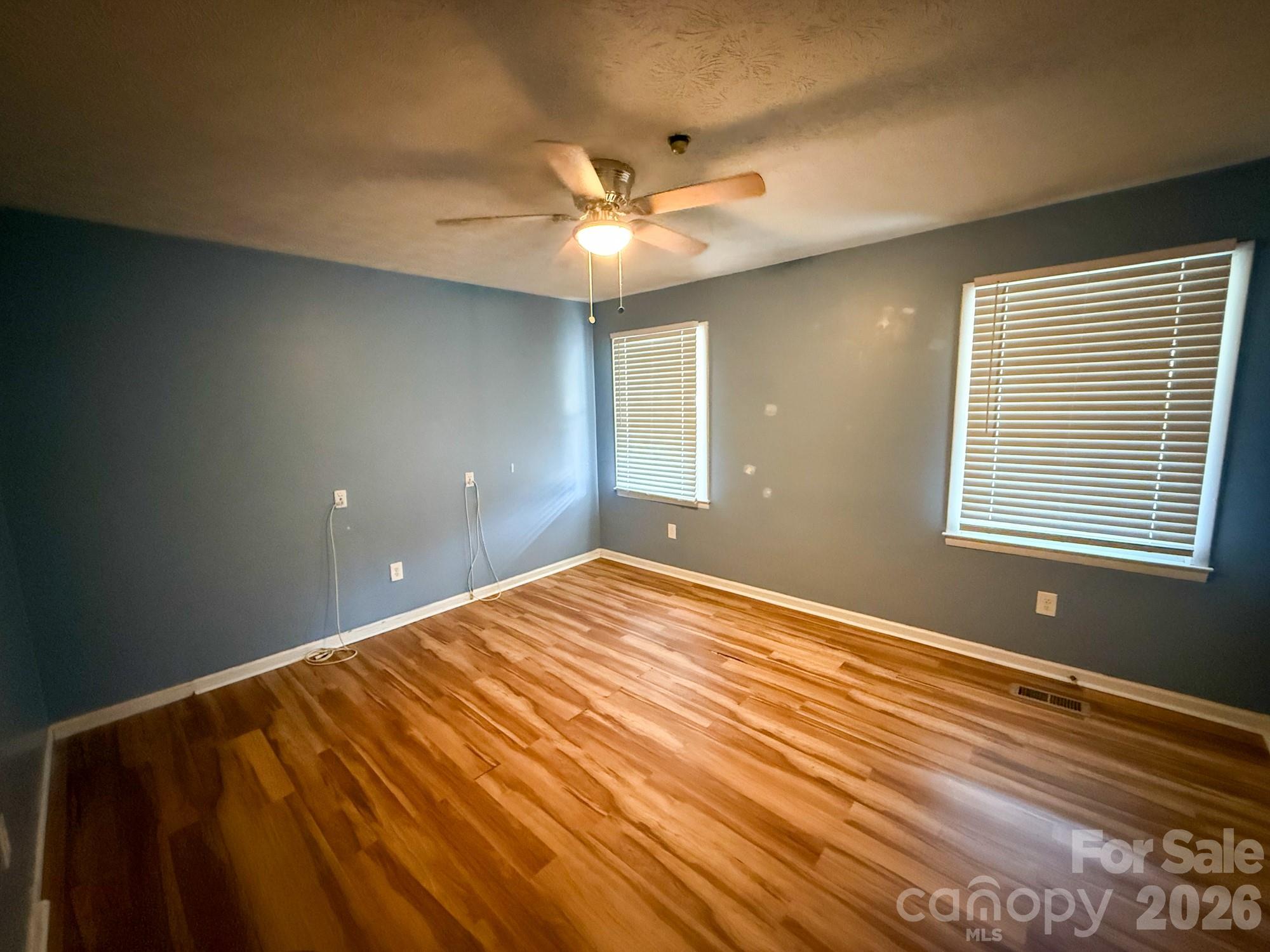 483 Caribou Road Asheville, NC 28803 - Photo 21 of 26 a view of an empty room with a window