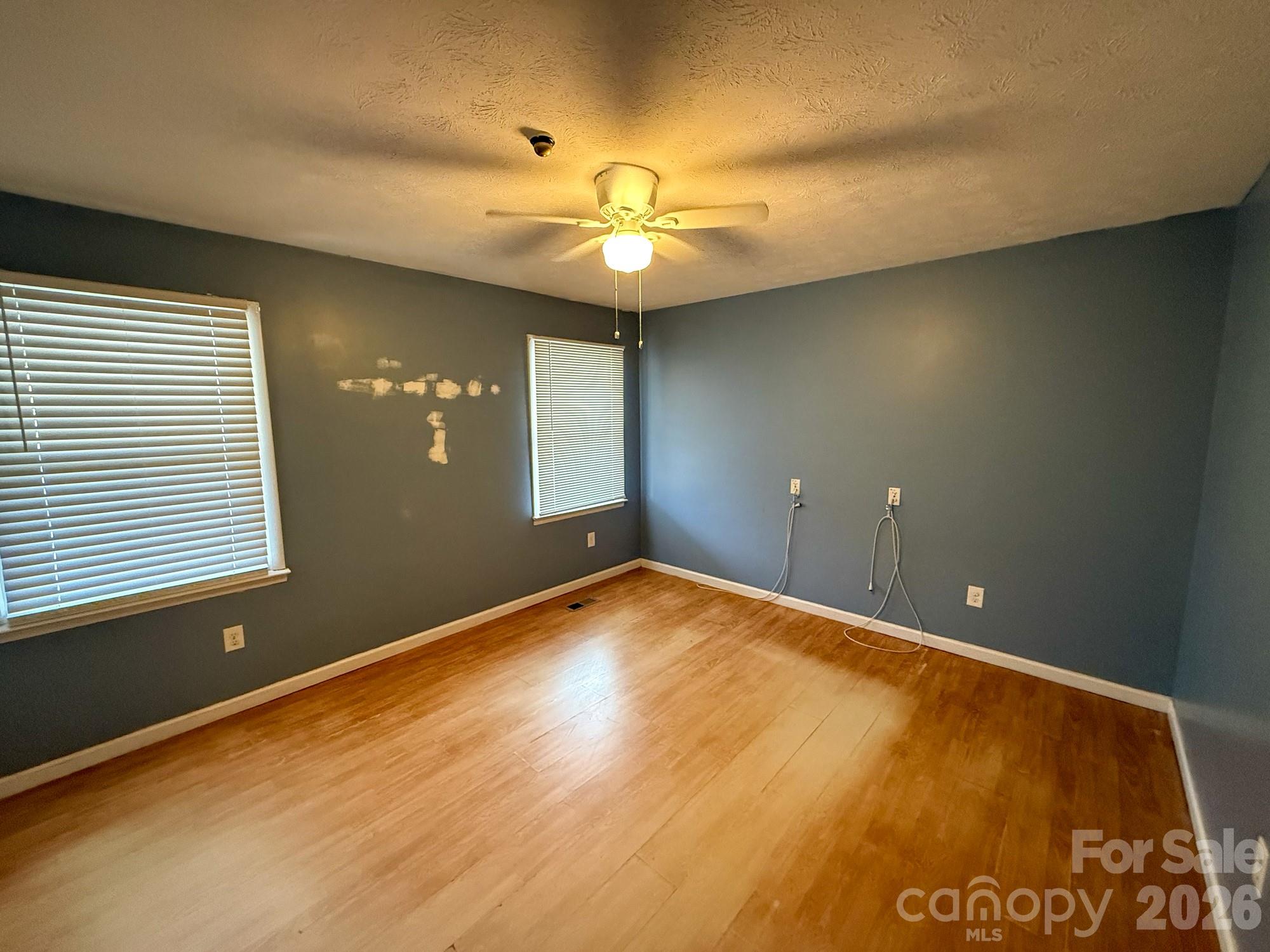 483 Caribou Road Asheville, NC 28803 - Photo 26 of 26 a view of an empty room with a window
