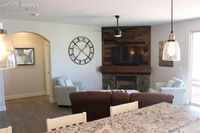 2473 Cinnabar Road Colorado Springs, CO 80921 - Photo 11 of 22 great room with gas fireplace