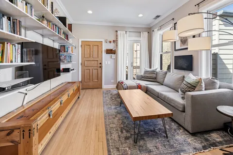 a kitchen with granite countertop stainless steel appliances and wooden cabinets