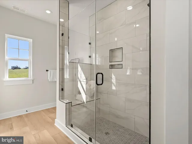 a view of a house with a yard balcony and seating area